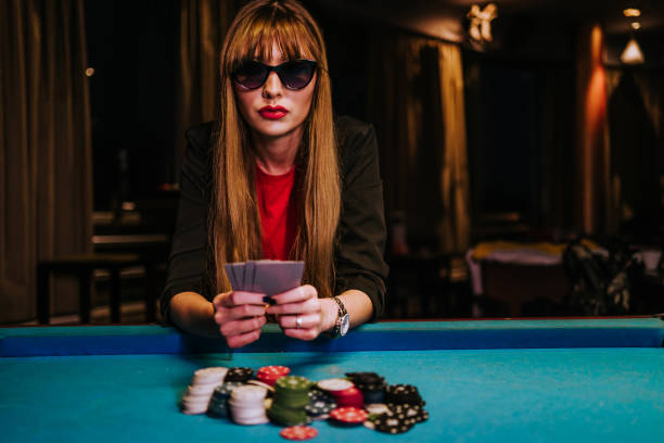 Baccarat table with multi-camera live feed showing dealer hand